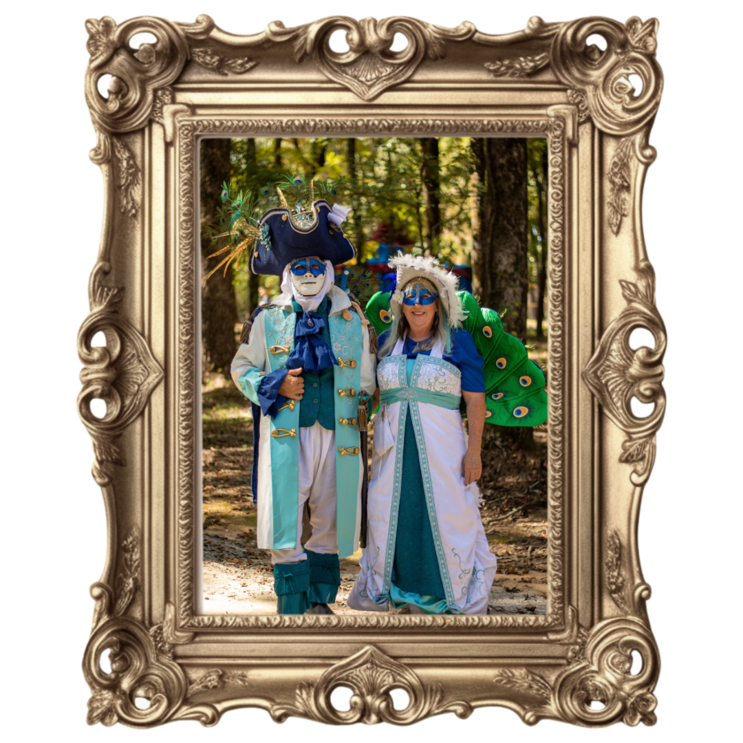 Two costumed people standing in a sunlit forest, framed by an ornate gold border.