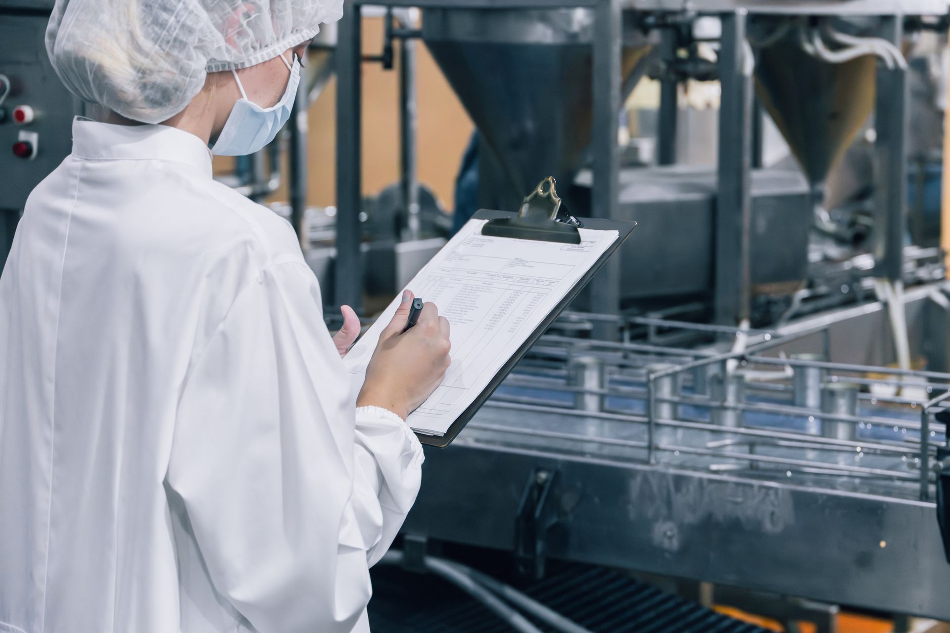 Food plant operations director reviewing safety protocols