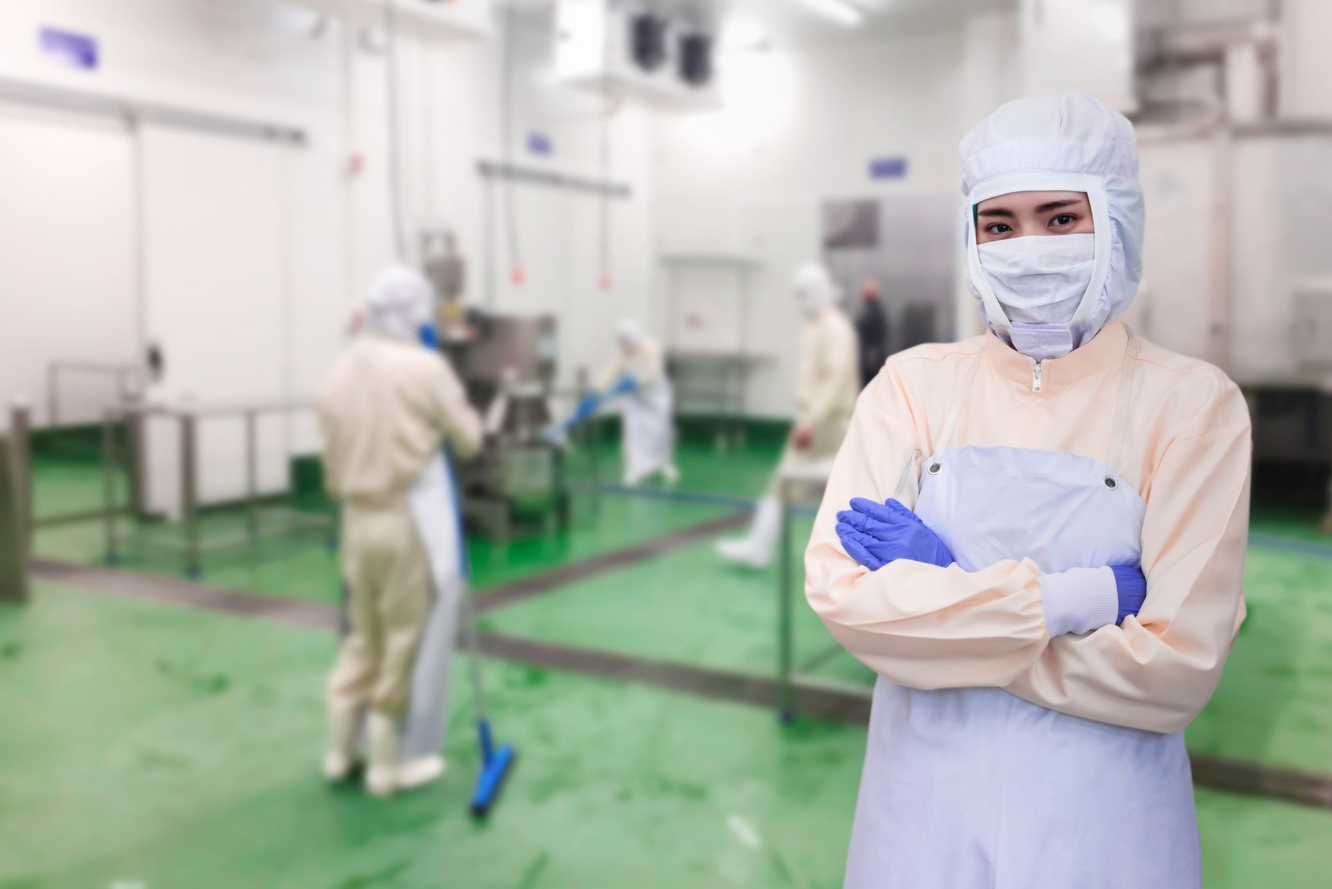 Quality assurance manager reviewing cleanroom sanitization standards