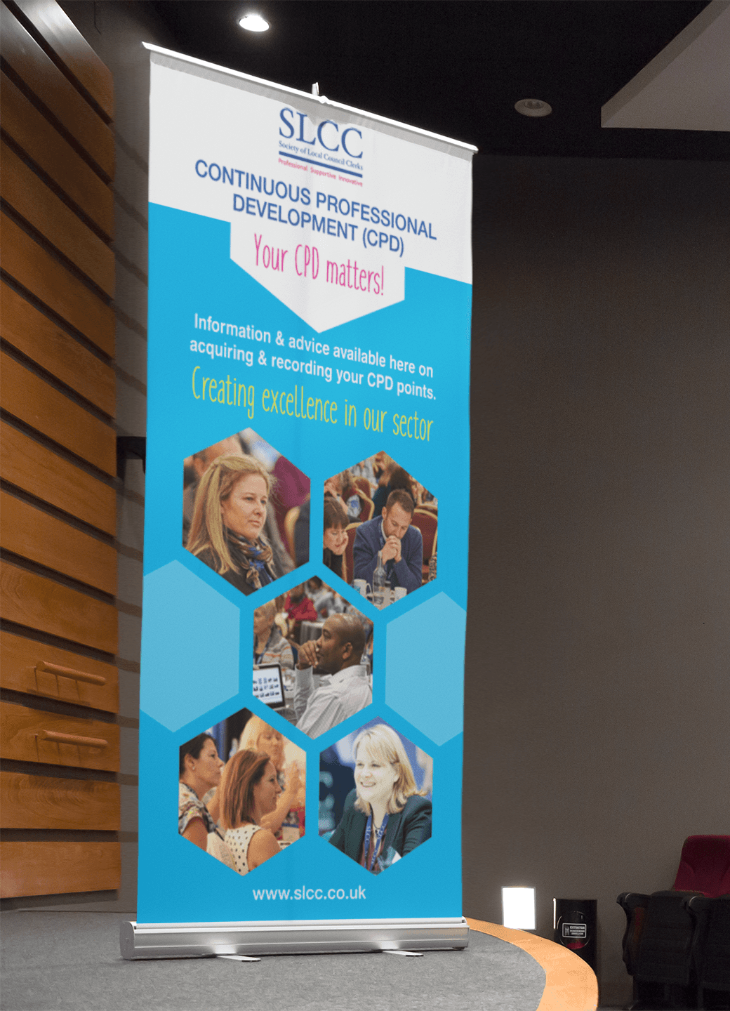 Roll-up banner: SLCC Continuous Professional Development. Turquoise background, honeycomb design with photos. 