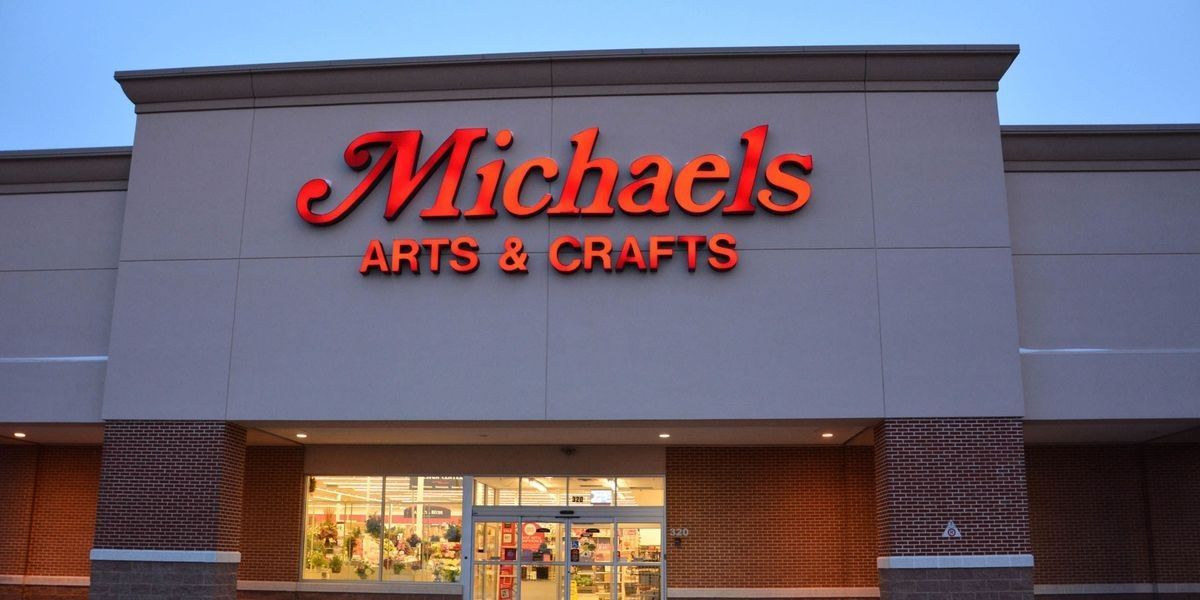 Michael's Arts & Crafts storefront with red sign above glass entrance.