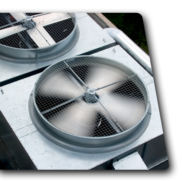 Contact Us Two rooftop ventilation fans with metal grilles on a white industrial unit