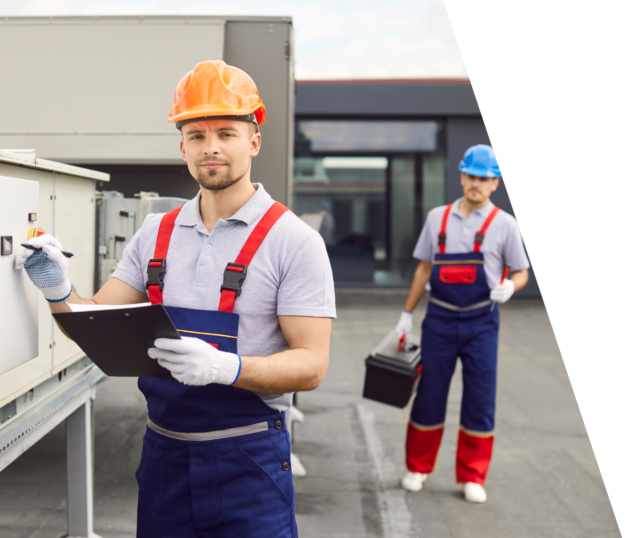Schedule Service! Two workers in hard hats inspecting electrical equipment outdoors, one holding a clipboard