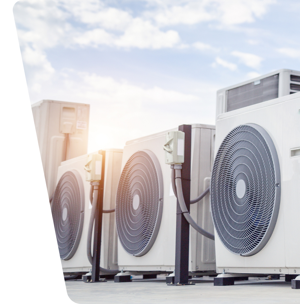 Contact Us Row of outdoor air conditioning units with large fans against a bright sky
