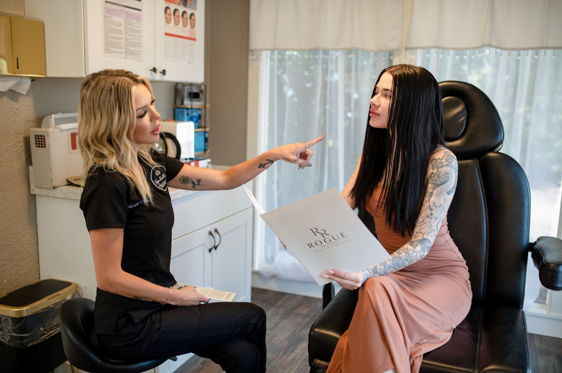 A woman wearing a mask is giving a massage to a patient.
