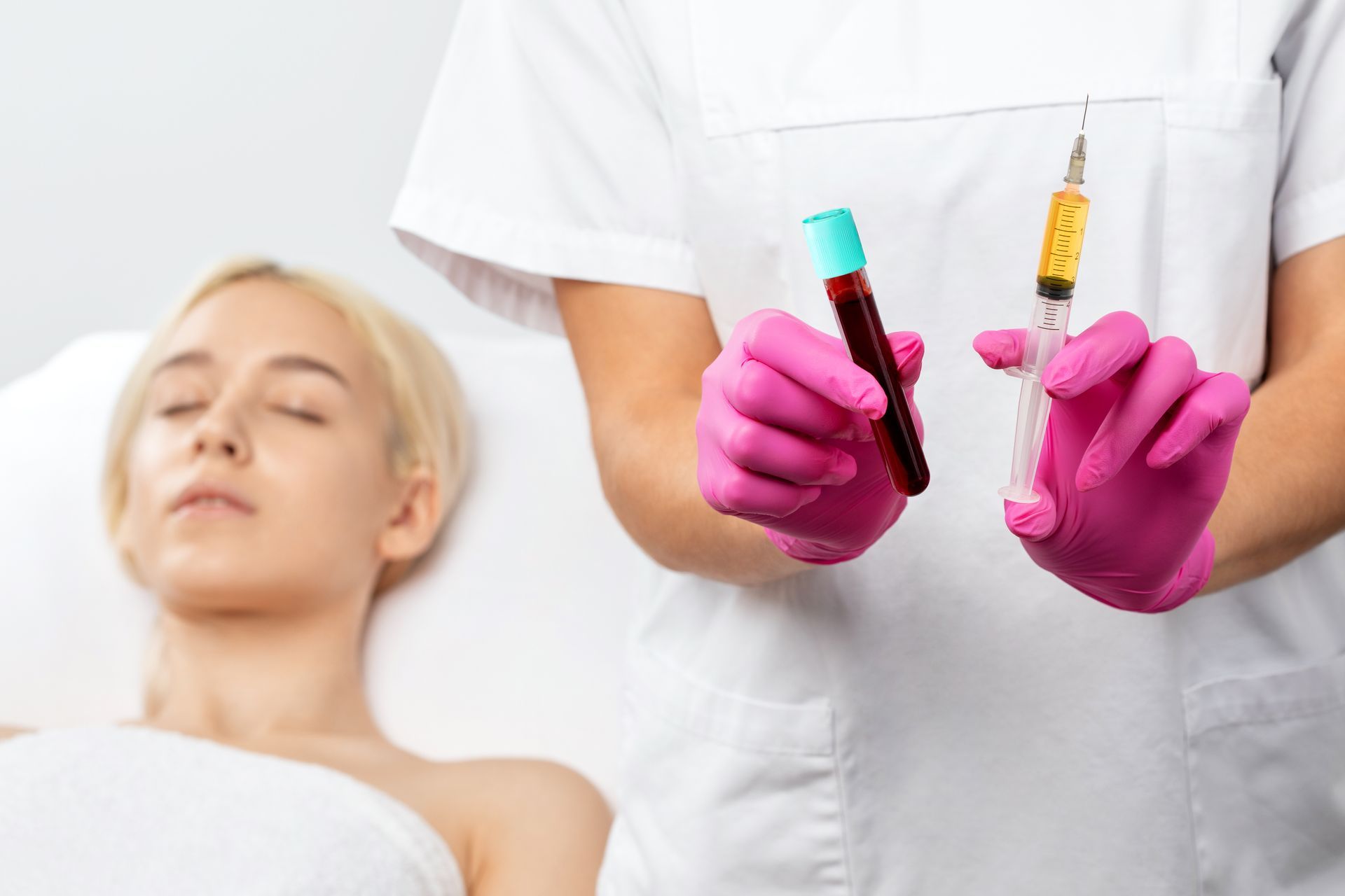 doctor holding up vials