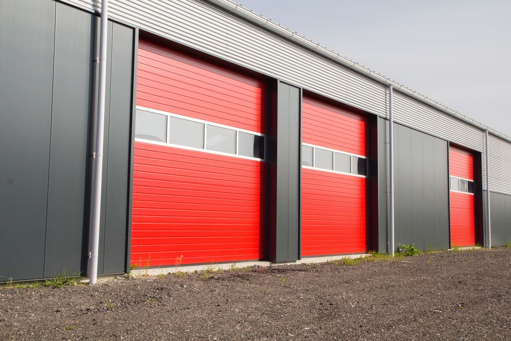 Storage Sheds Hervey Bay With Red Roller Doors
