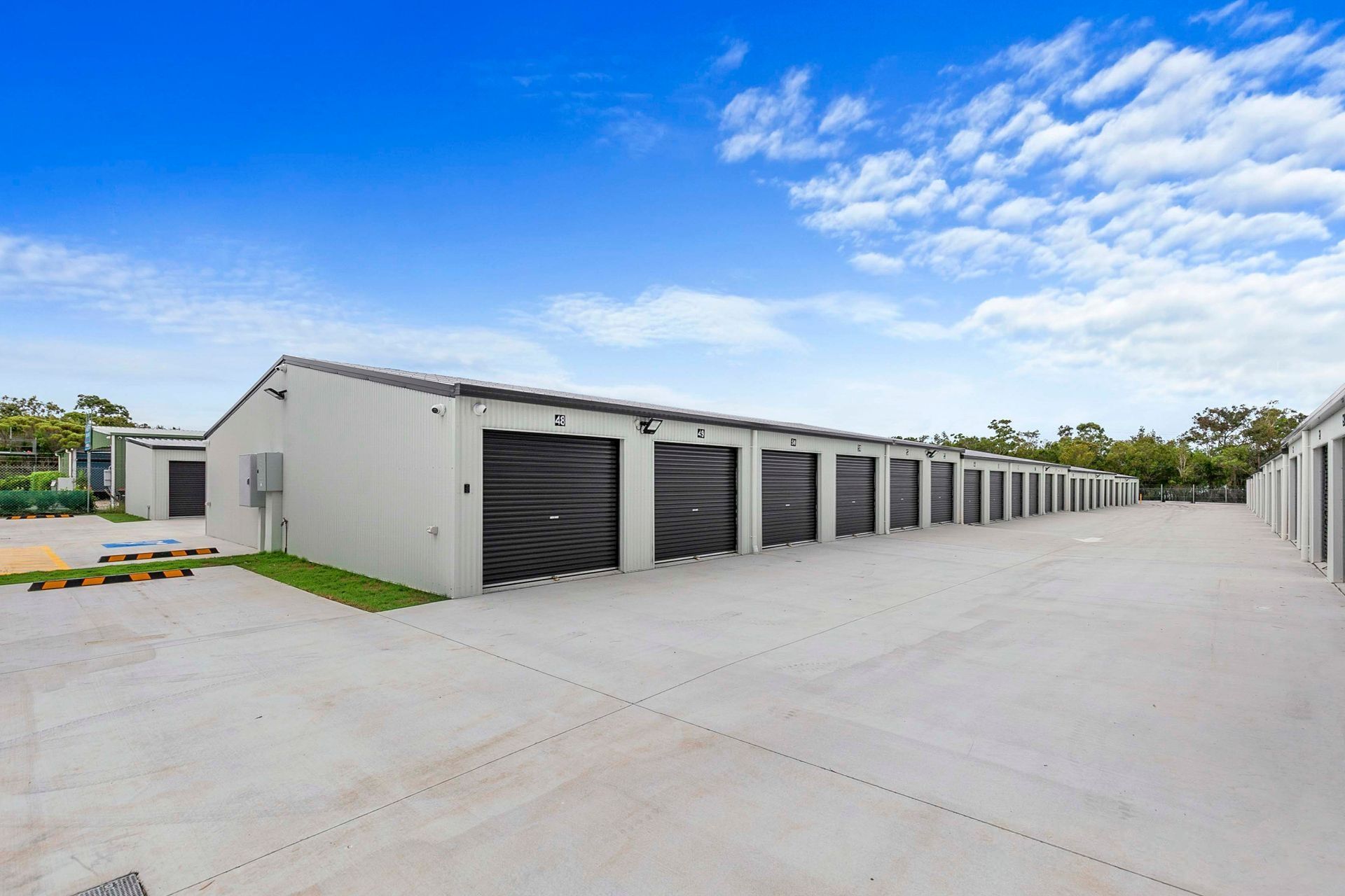 Row Of Blue Storage Unit In A Light Gray Building