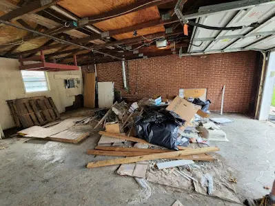 There is a lot of trash in the garage.