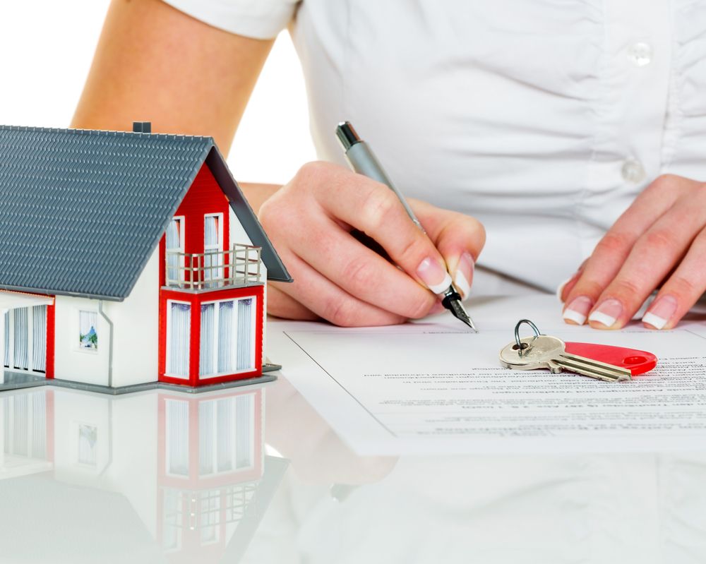 Client Signing Home Insurance Documents