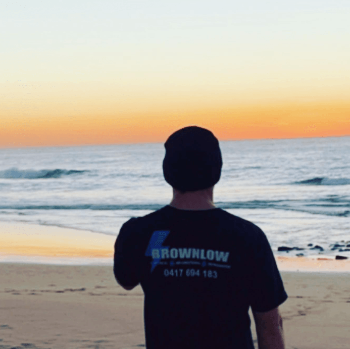 Handyman Installing Smoke Detector — Brownlow Electrical Air Conditioning Refrigeration In Fairy Meadow, NSW