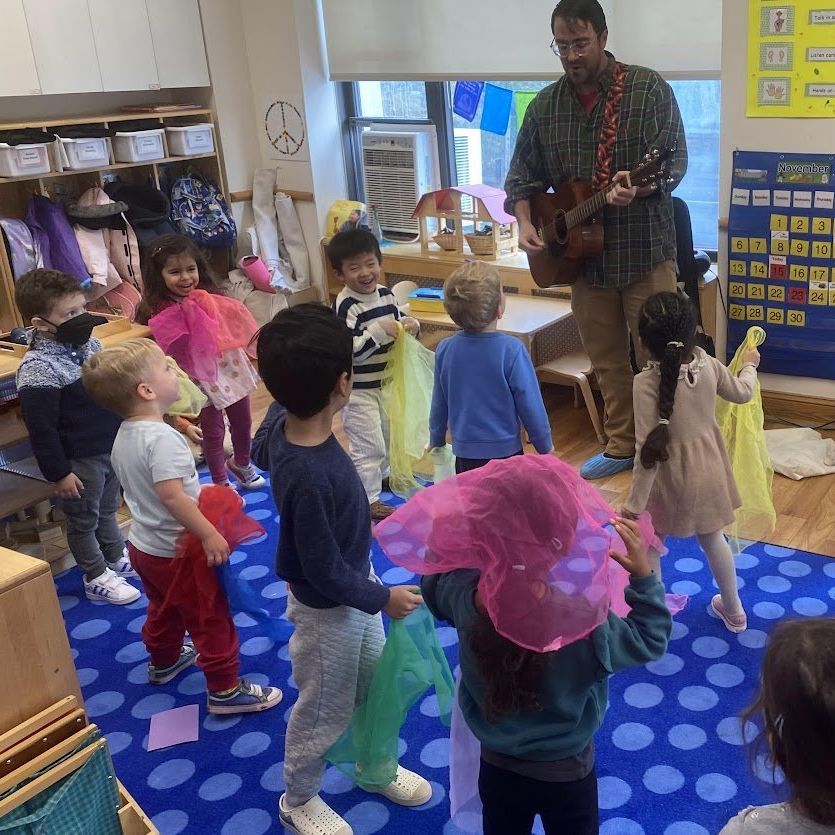 Montessori children in music class