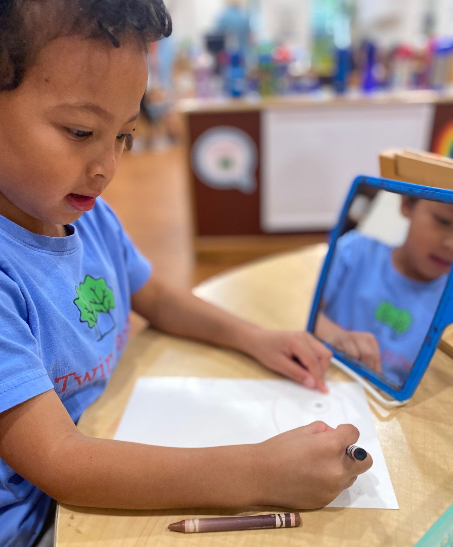 Montessori child working on fine motor skills