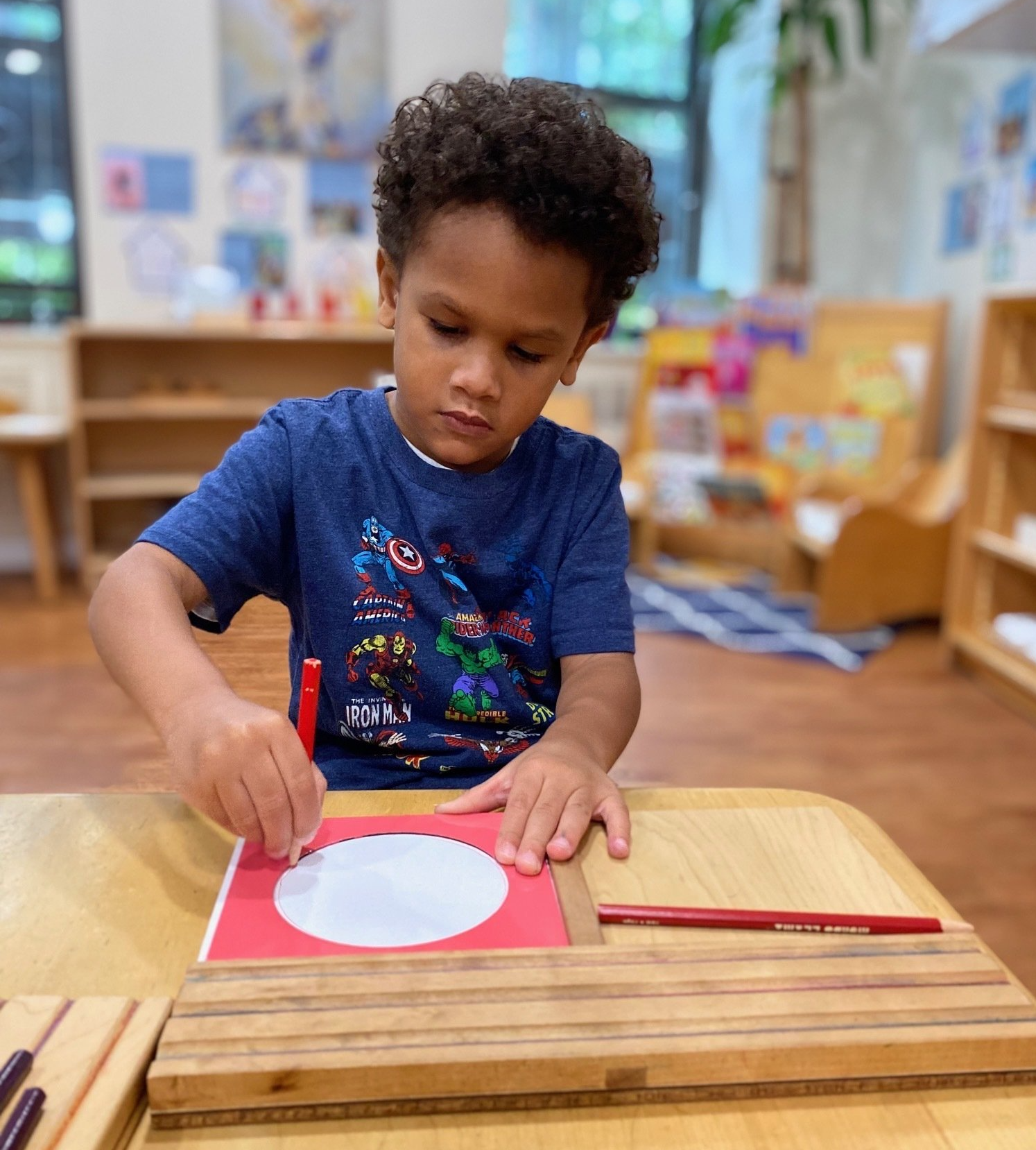 Child working with Montessori materials
