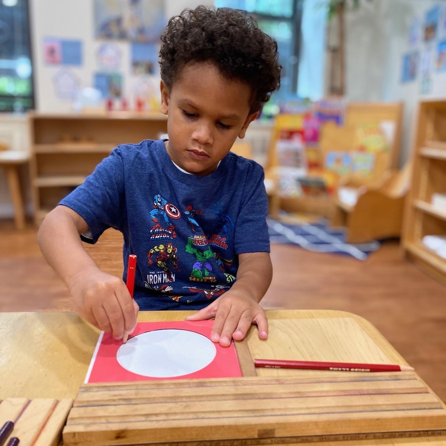 Child working with Montessori materials