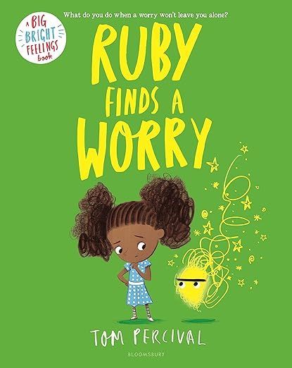 Ruby, a girl with dark skin and curly hair, looking sad. A yellow, glowing worry beside her on a green background.