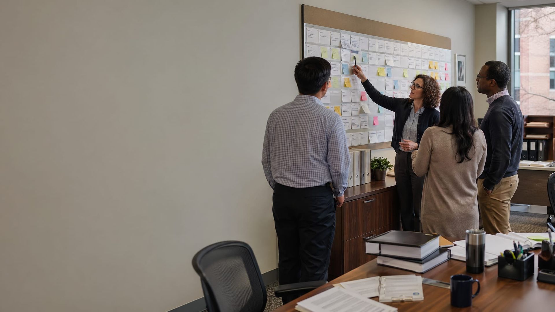 Team members working through organizational change together