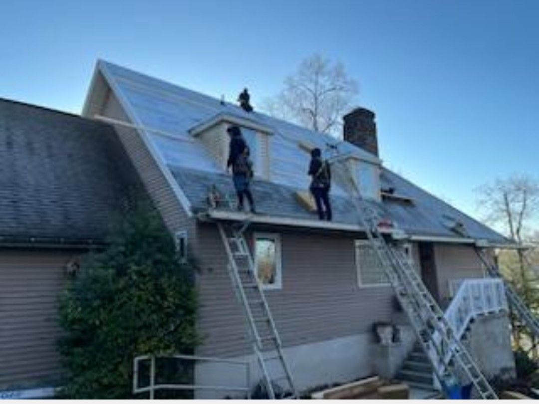 Worker Installing Roof — Hanover, PA — ANCXUS Roofing Solutions