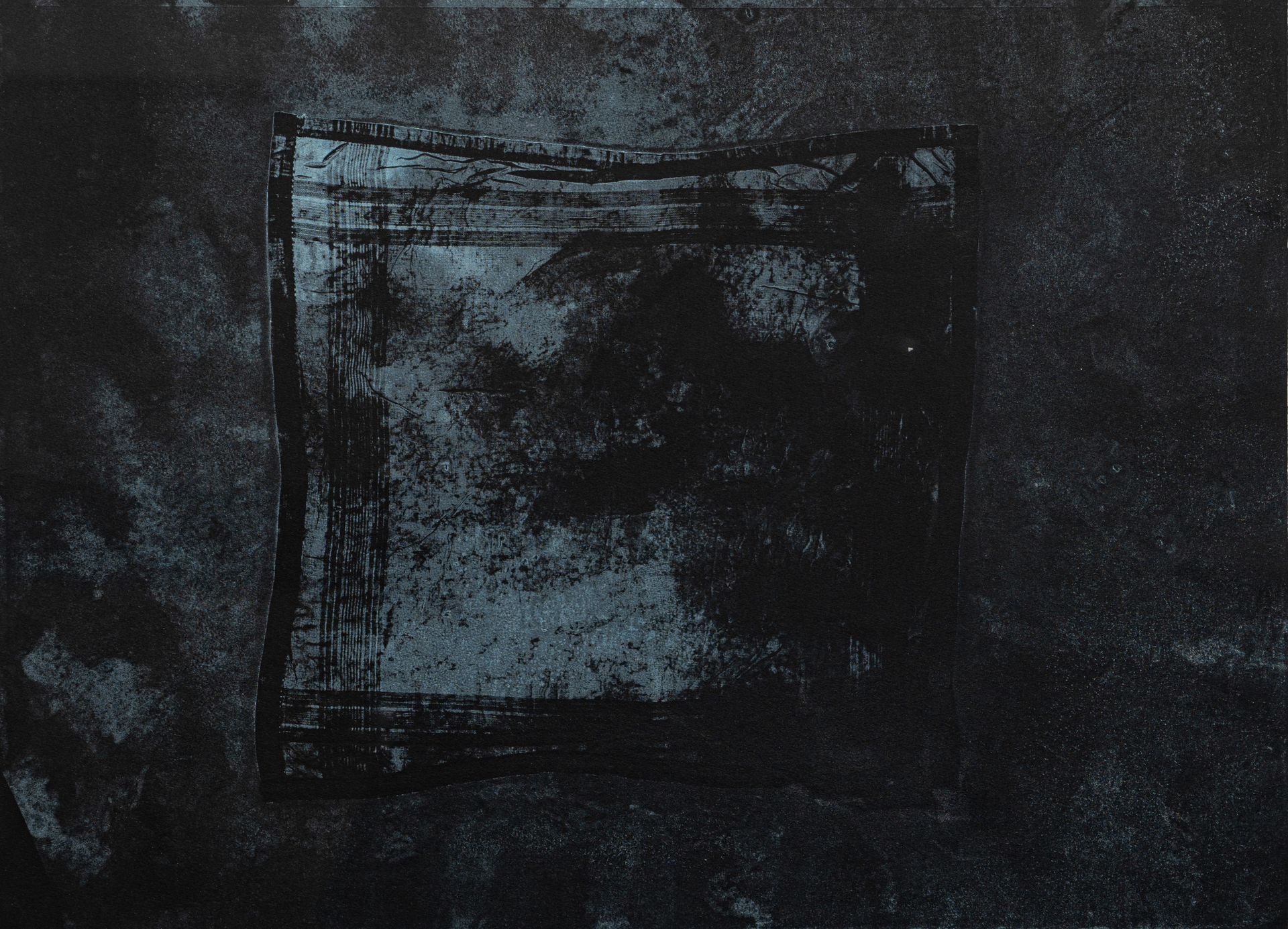 Dark abstract painting with a central, square shape in lighter shades against a textured black background.