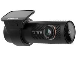 Black dash camera with front screen and wide-angle lens, labeled 4K UHD.