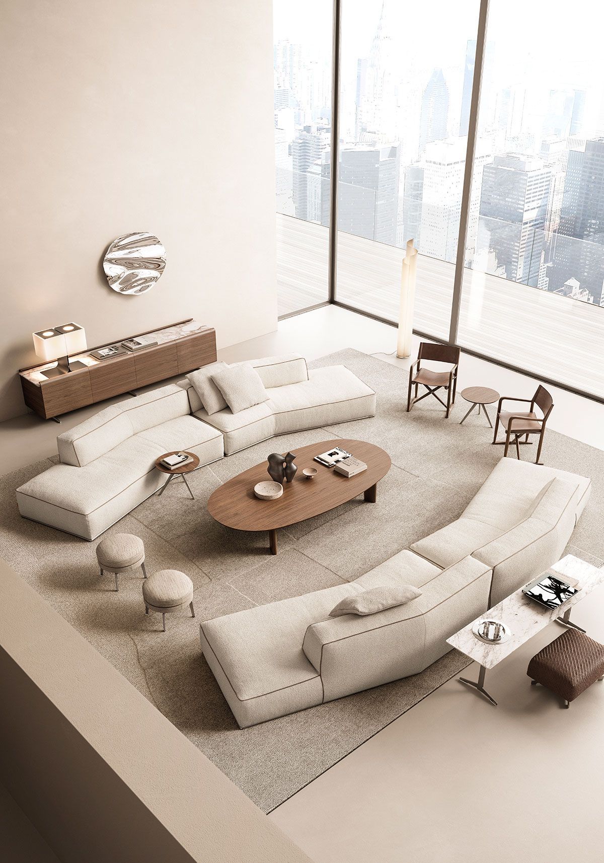 Moderna sala de estar de color beige con sofás curvos, mesa de centro redonda
