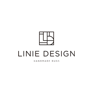 Logotipo minimalista negro de “LINIE DESIGN” con “HANDMADE RUGS” debajo sobre un fondo blanco.