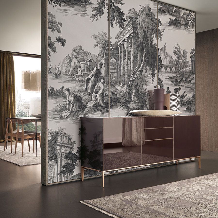 Habitación moderna con papel pintado con motivos paisajísticos en blanco y negro, armario con espejo y una puerta
