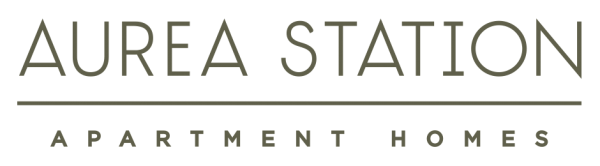 Aurea Station Apartment Homes logo in gray and gold text on a white background