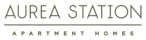 Aurea Station Apartment Homes logo in gray and gold text on a white background