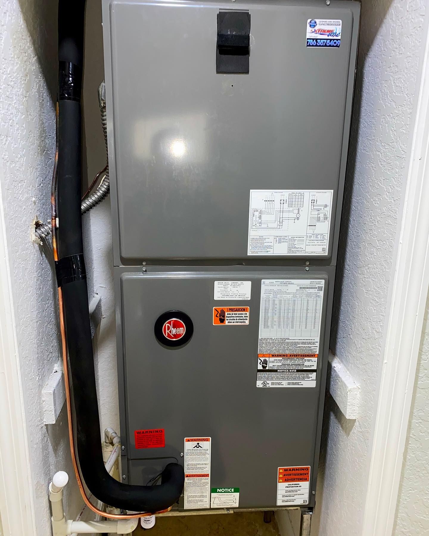 Indoor Rheem HVAC air handler providing residential heating and air conditioning service