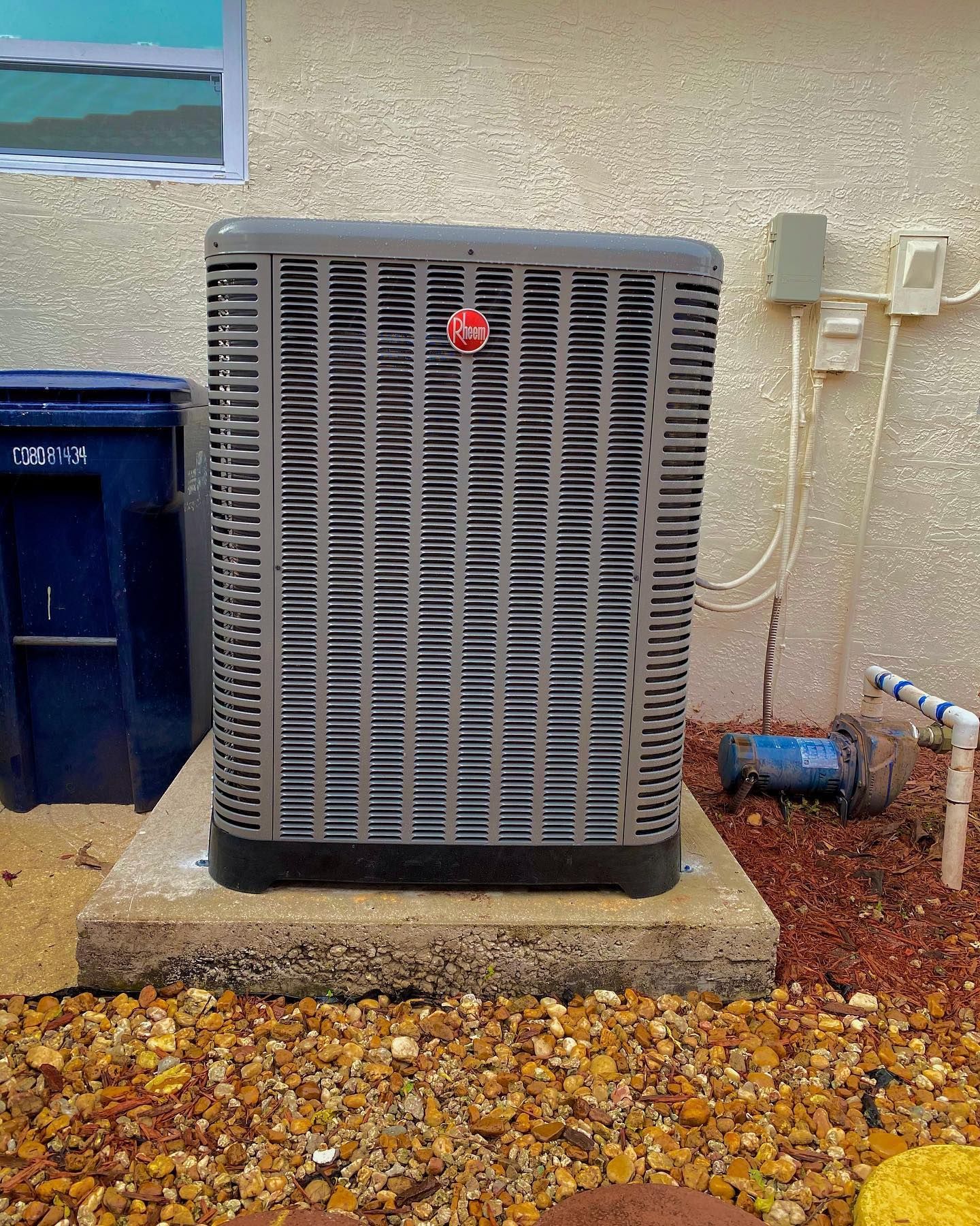 Newly installed Rheem heat pump system for efficient home heating and cooling