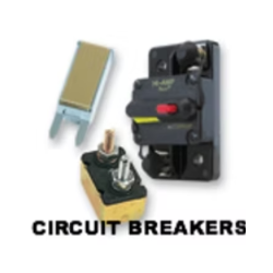 Circuit breakers of different styles, including a rectangular blade fuse and a panel-mounted breaker.