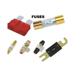 Collection of various automotive fuses in different shapes and sizes.