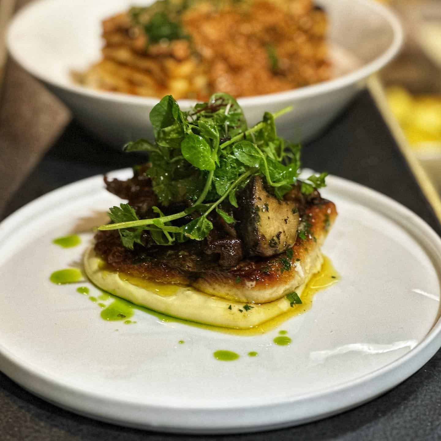 A Close Up of a Plate of Food on a Table — Onesta Cucina in Bowral, NSW