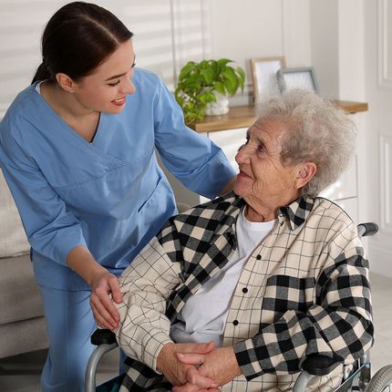 Helper With Elder Woman