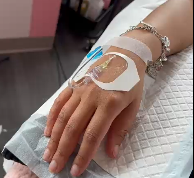 hand with needle mobile iv therapy from home urbanrx health lounge in houston, tx