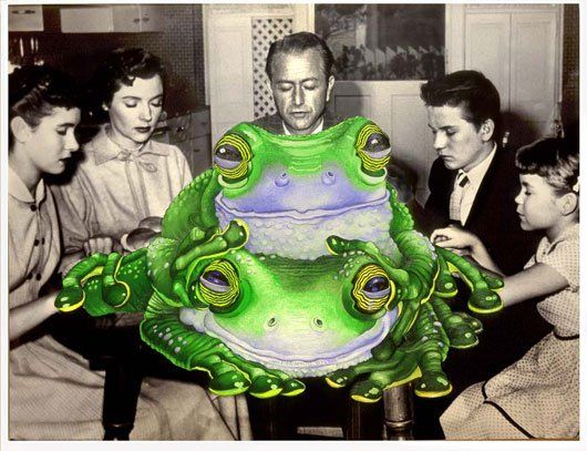 A group of people are sitting around a large green frog
