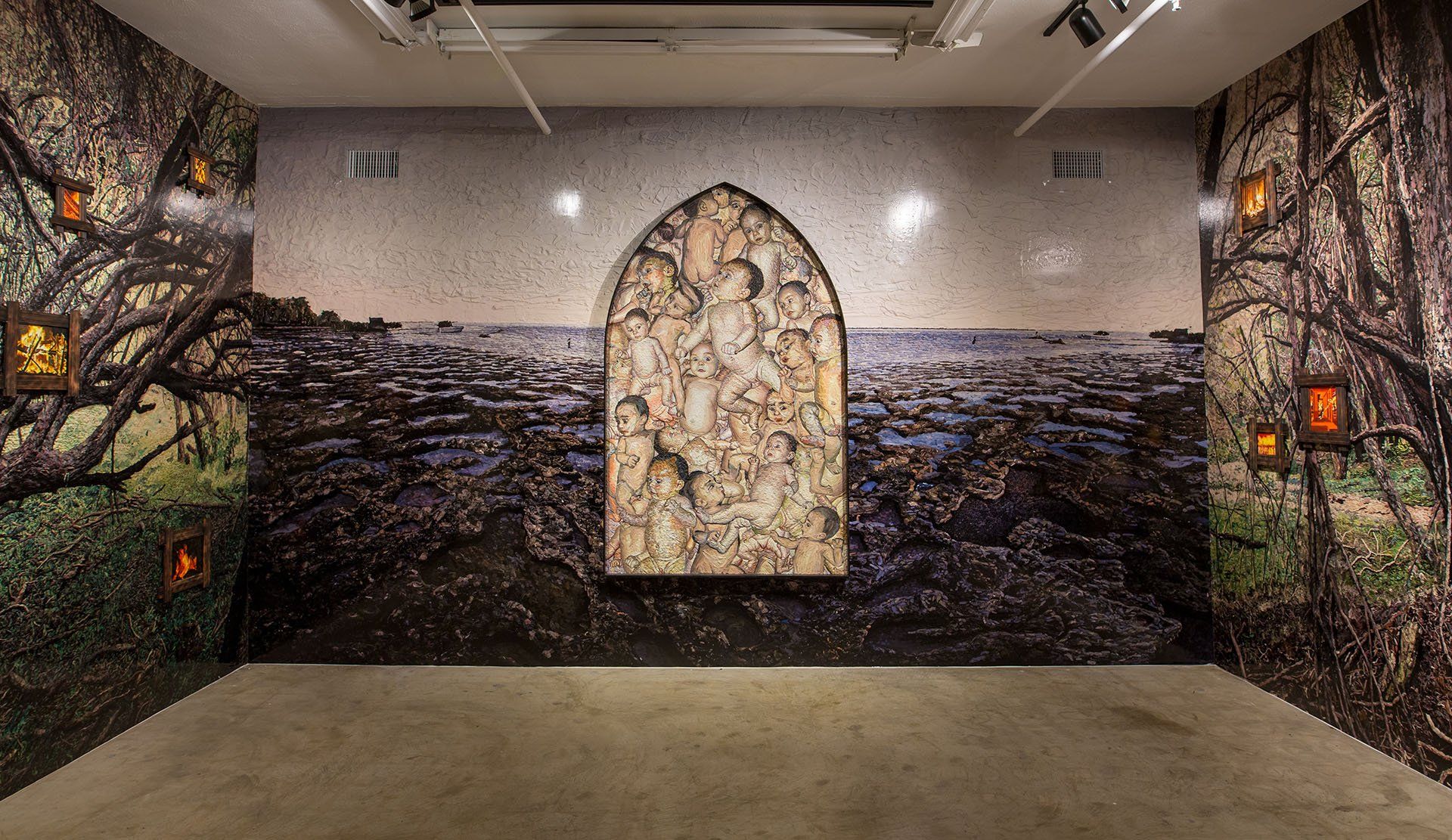 An empty room with a painting on the wall