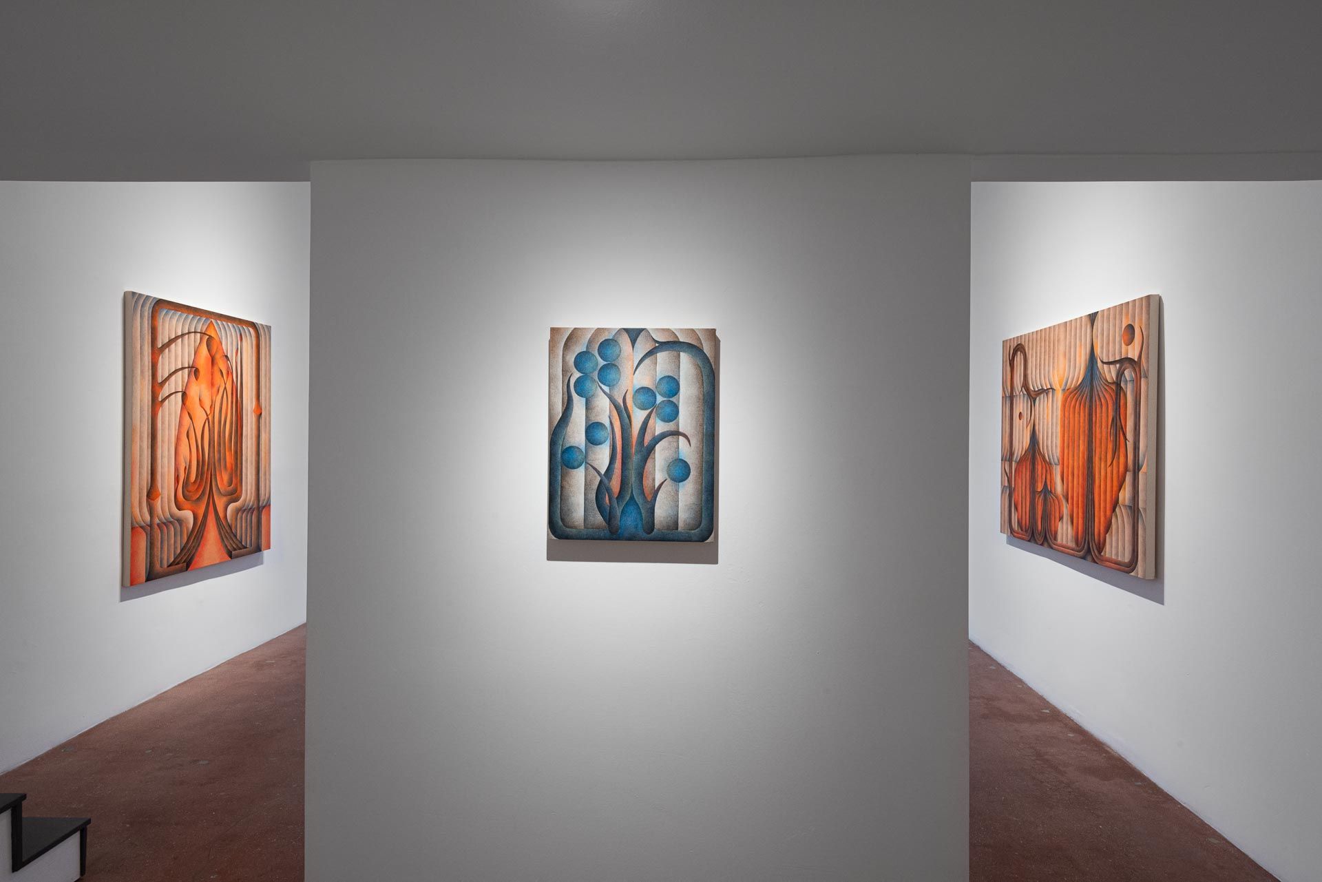 Three paintings on white walls: orange, blue-and-white with blue circles, orange. Installation view, Roberta Gentry: Blood Orange, Track 16, Los Angeles.