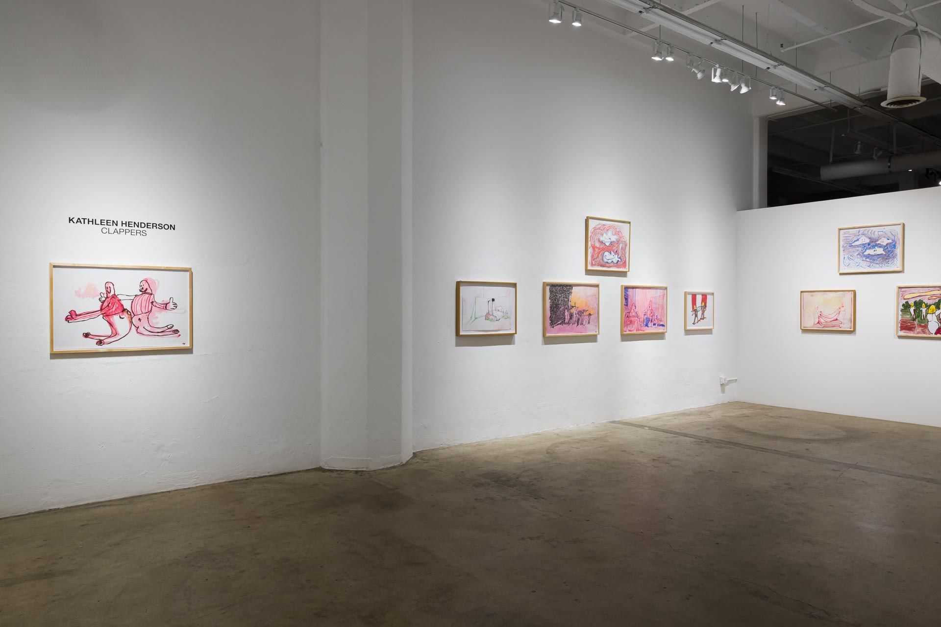 Pink ghost drawing under the title text in the foreground, with more small framed drawings along the wall beyond. Installation view, Kathleen Henderson: Clappers, Track 16.