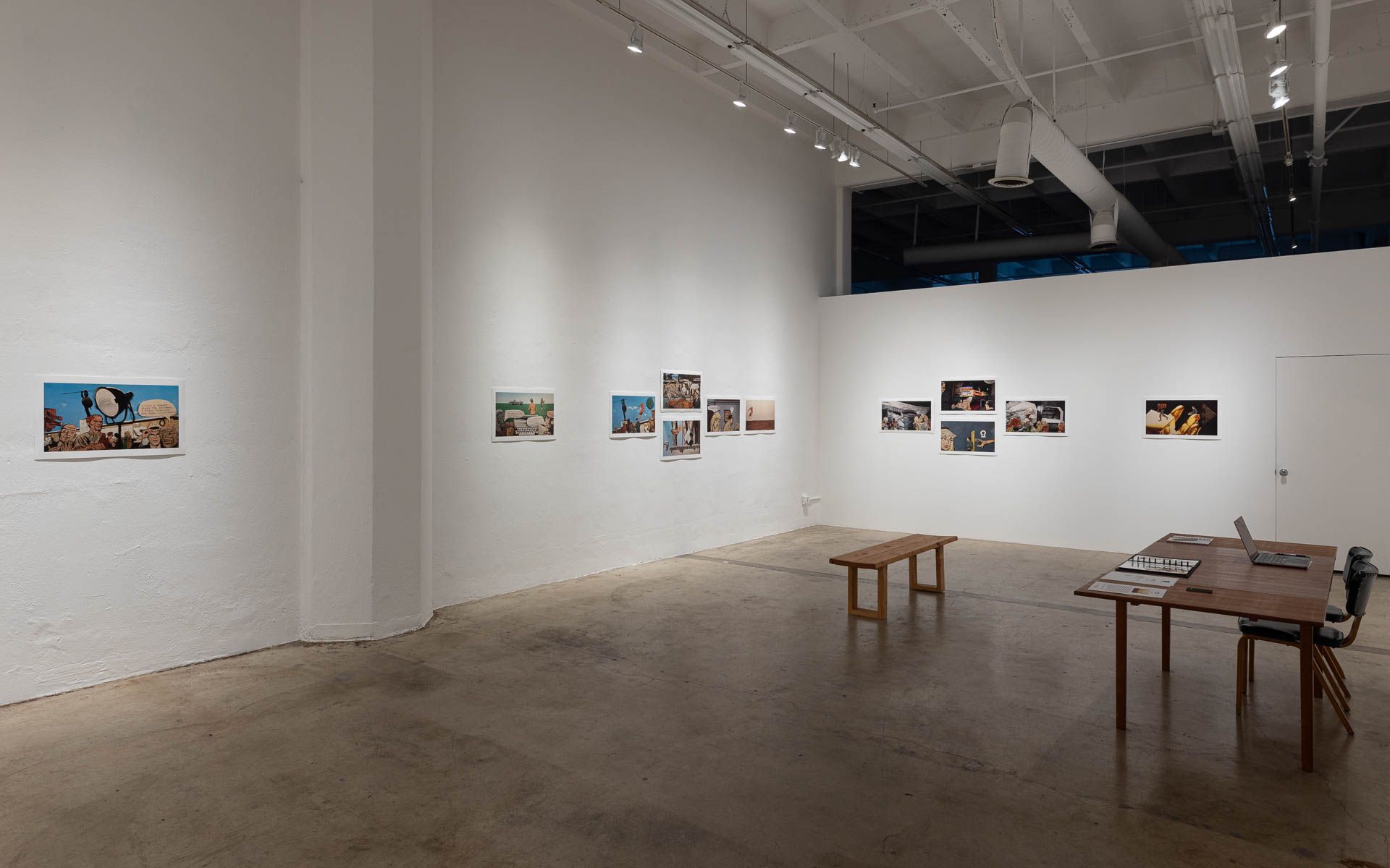 There are a lot of pictures on the wall in this room.