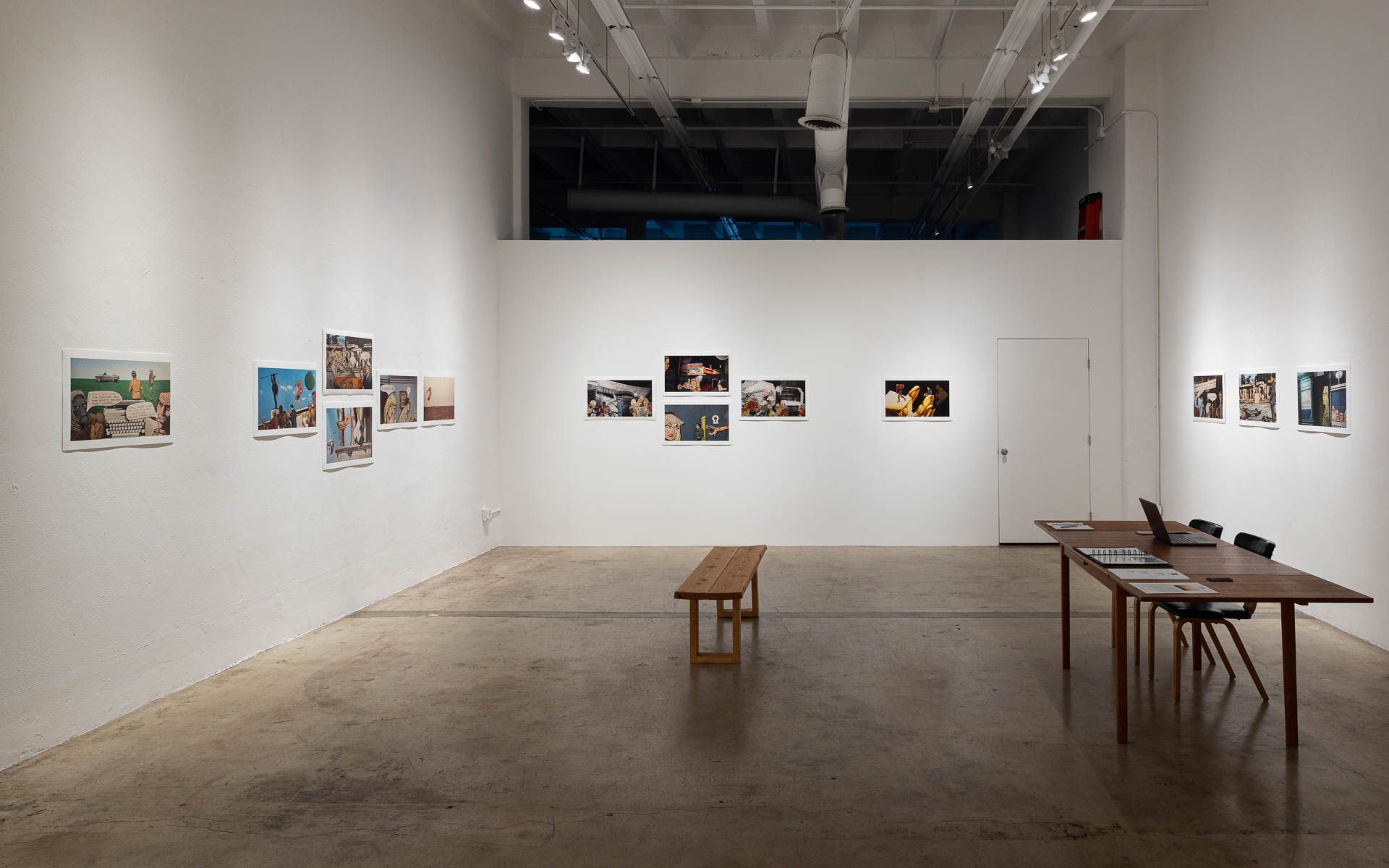 There are a lot of pictures on the wall in this room.
