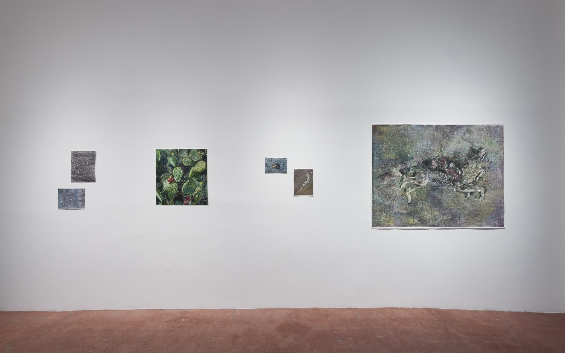 Blue-green textured painting of a figure on a white wall beside a staircase, a small dark painting at left and a glass door at right. Installation view, Molly Segal: As We Grind Our Teeth To Dust, Track 16.