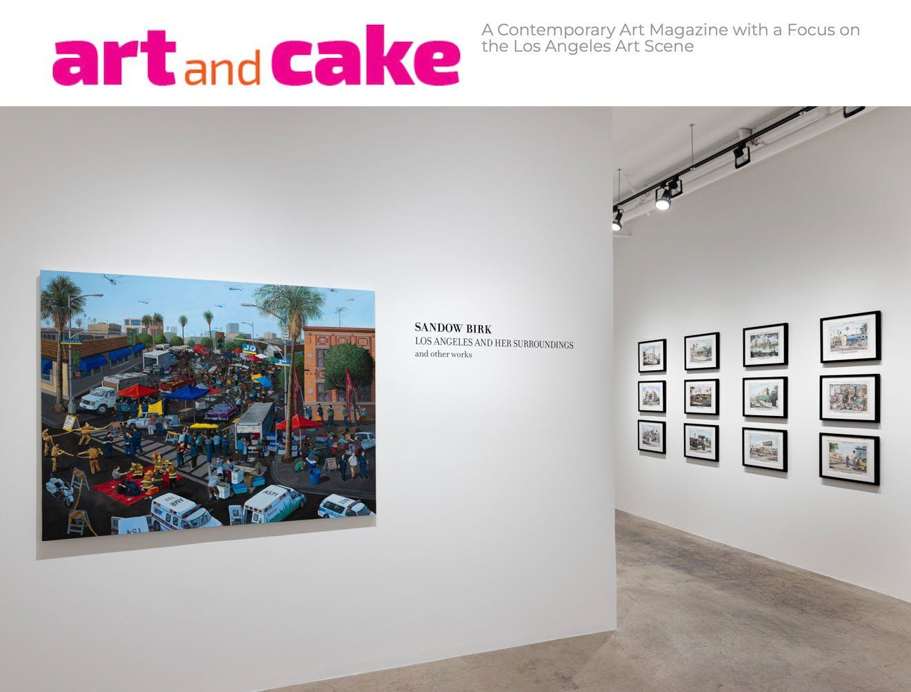 An art and cake magazine is displayed on a wall