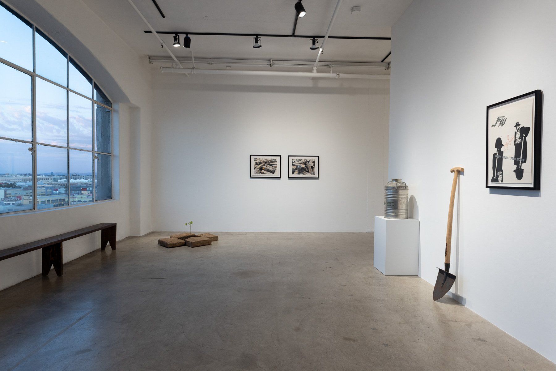 An empty room with a shovel on the floor