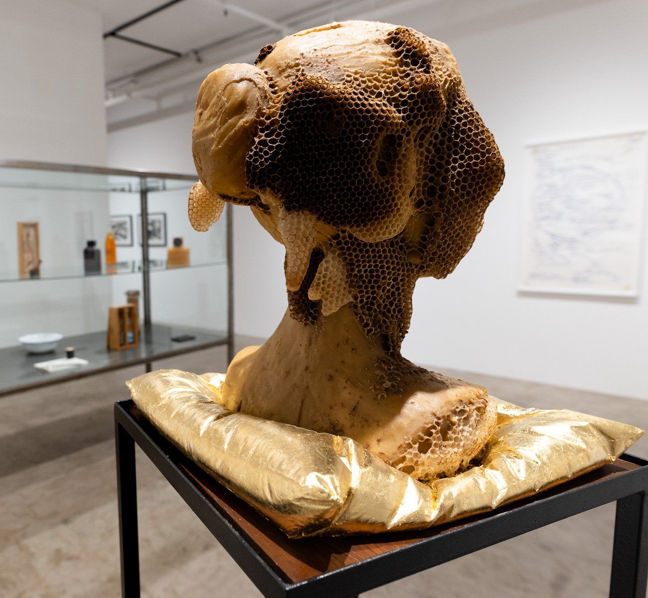 A statue of a dog is on display in Track 16 Gallery