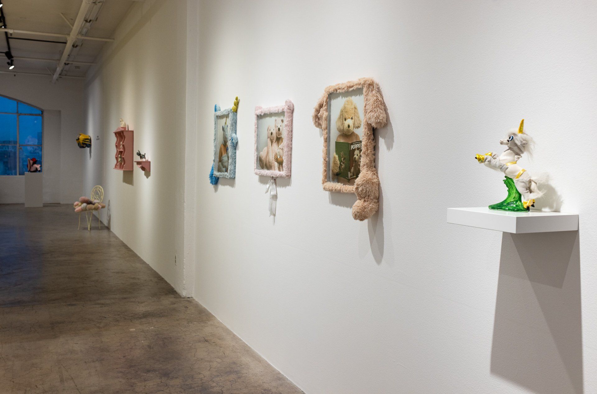 There are a lot of sculptures on the wall in this room.