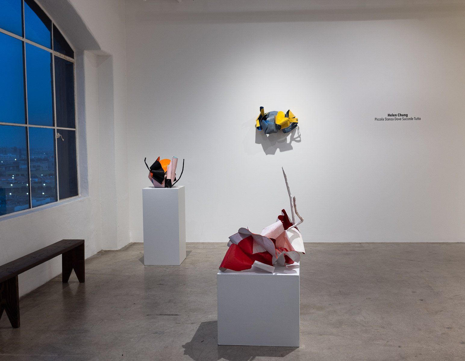 There are a lot of sculptures on display in this room.