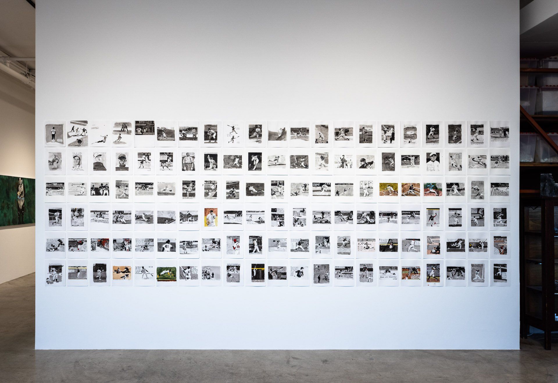 A wall with a lot of pictures on it