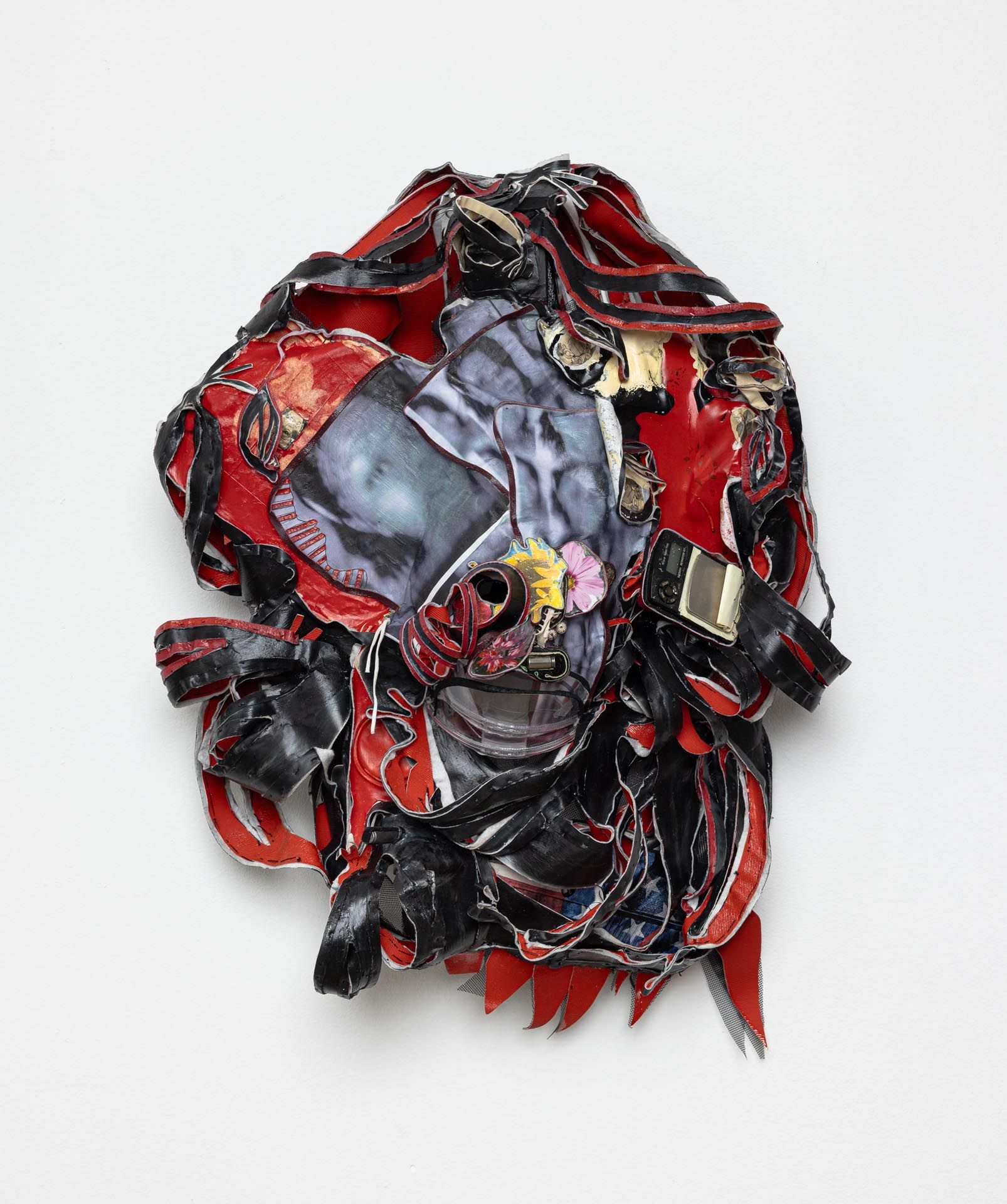 Vinyl, bullet casings, recycled paper, broken scale, screen printing ink, Challenge newspaper, laser prints (flowers: Inglewood, CA, & Breonna Taylor). 30 x 25 x 21 inches